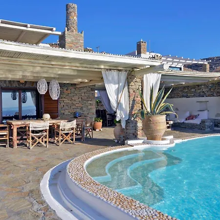 Villa Luxurious Waterfront Christina In The Area Of Melissaki With A Swimming Pool, Sea And Sunset View