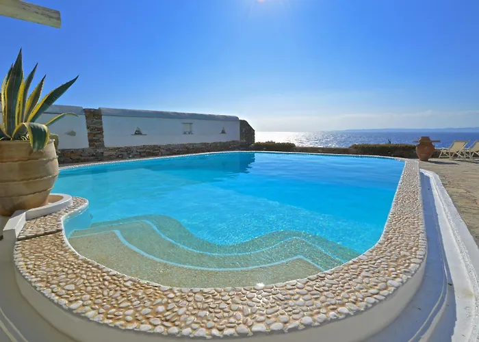 Villa Luxurious Waterfront Christina In The Area Of Melissaki With A Swimming Pool, Sea And Sunset View Ioulis